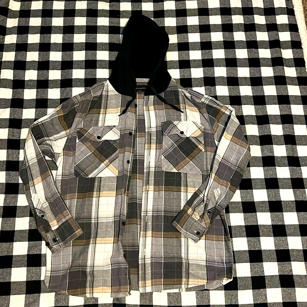 A medium sized hoodie flannel.